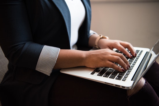 woman is working with her laptop